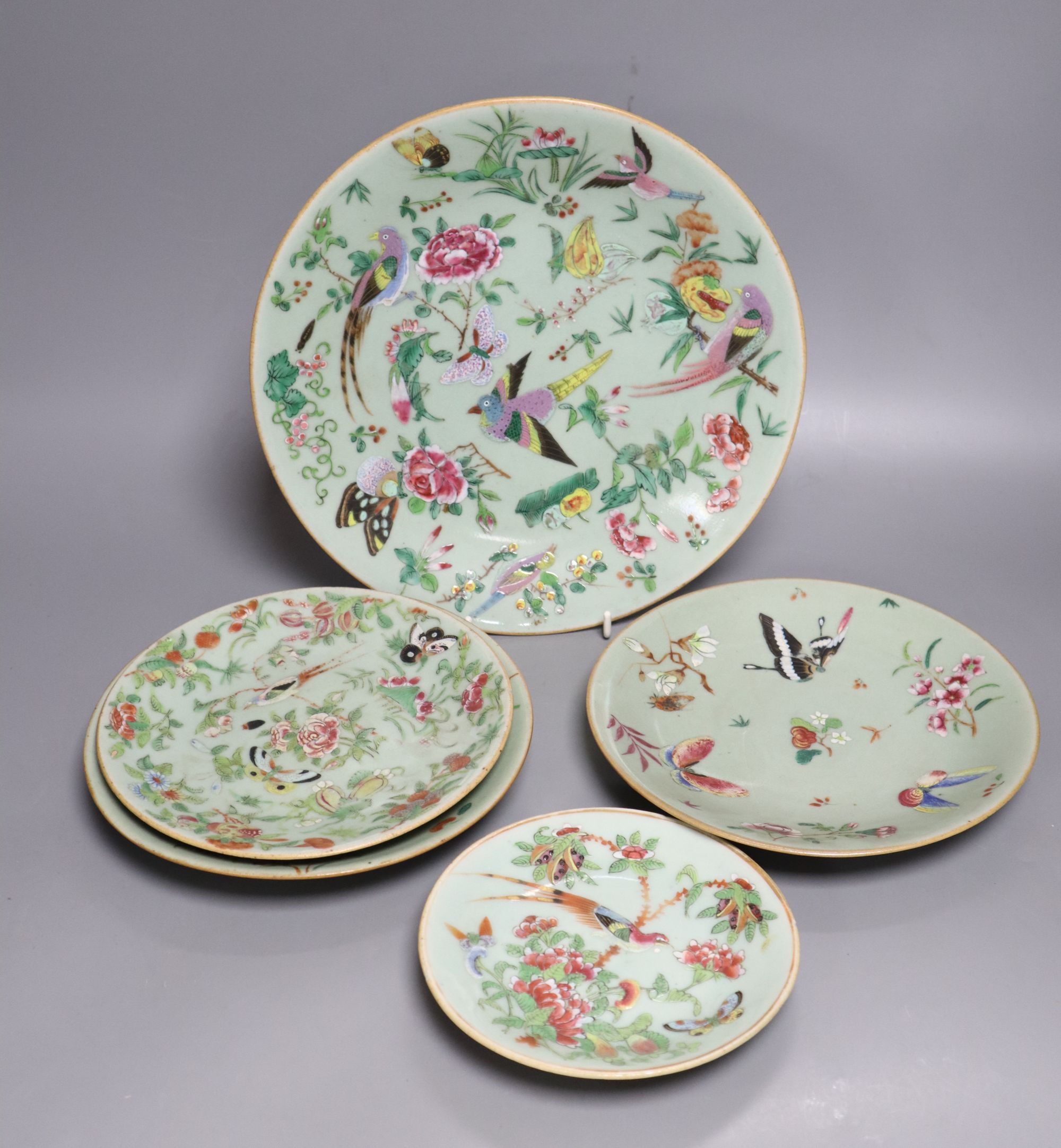 A set of five Chinese celadon famille rose plates, largest diameter 26cm